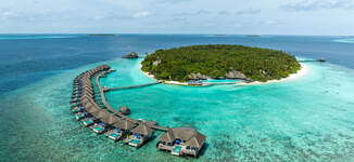 dusit-thani-maldives-exterior-whole-island-view%20(1)-1-Grande.jpg