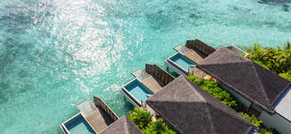 dusitd2-feydhoo-maldives-water-front-villas-exterior-view-with-ocean-Grande%20vignette.jpg